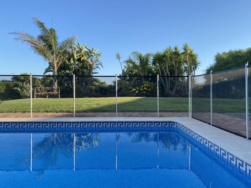 Mesh Fence Secured Around Pool